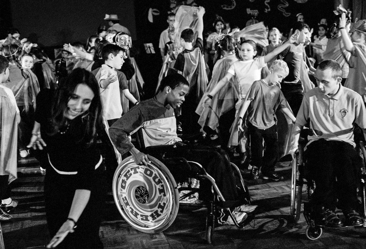 GB. WALES. Cardiff. Patua Dance Company working with disabled children at the City Hall. 2004.