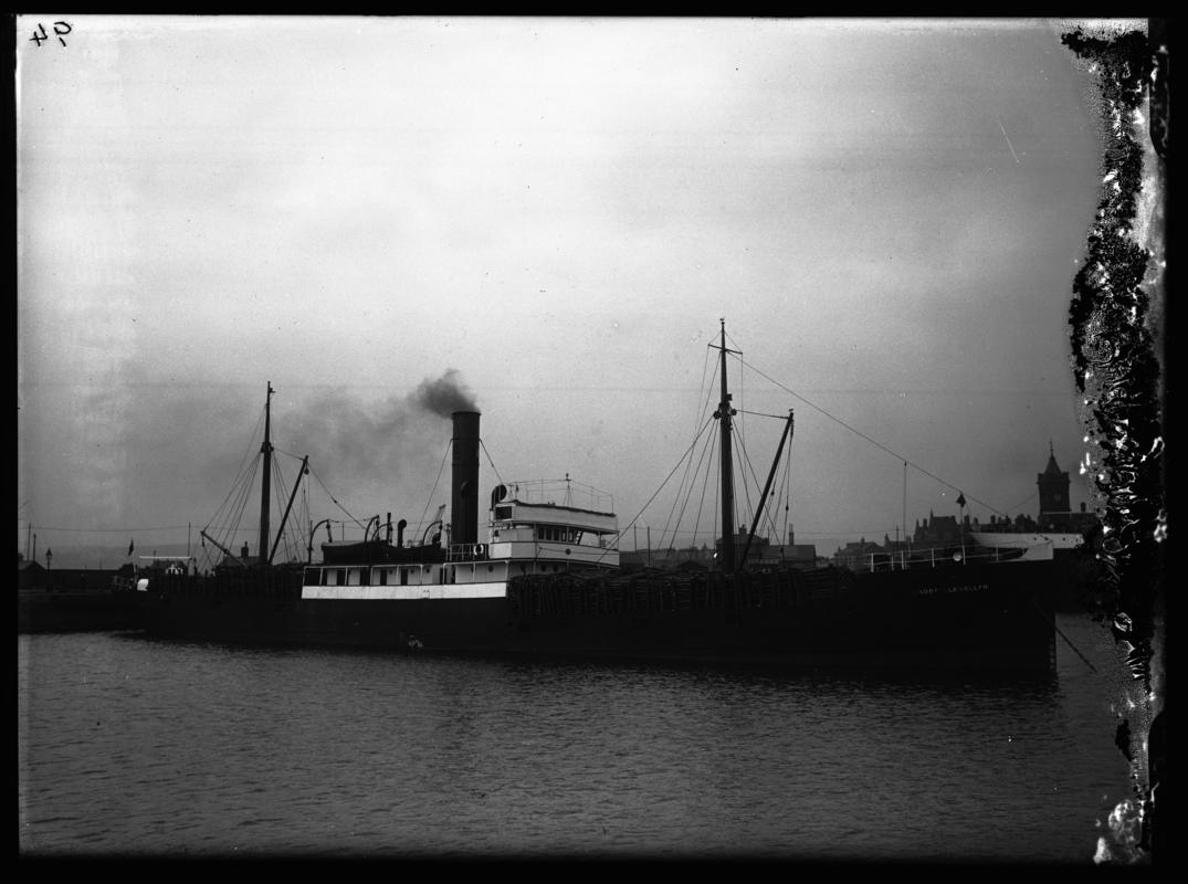 Starboard broadside view of S.S. MADGE LLEWELLYN and cargo pit props, Cardiff Docks, c.1936.