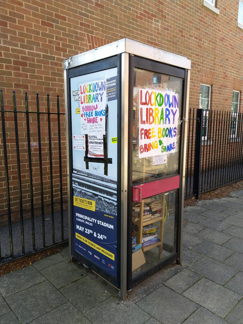 Exterior of Lockdown Library book exchange phone booth by Ysgol Mynydd Bychan, Canada Road, Cathays, Cardiff.
