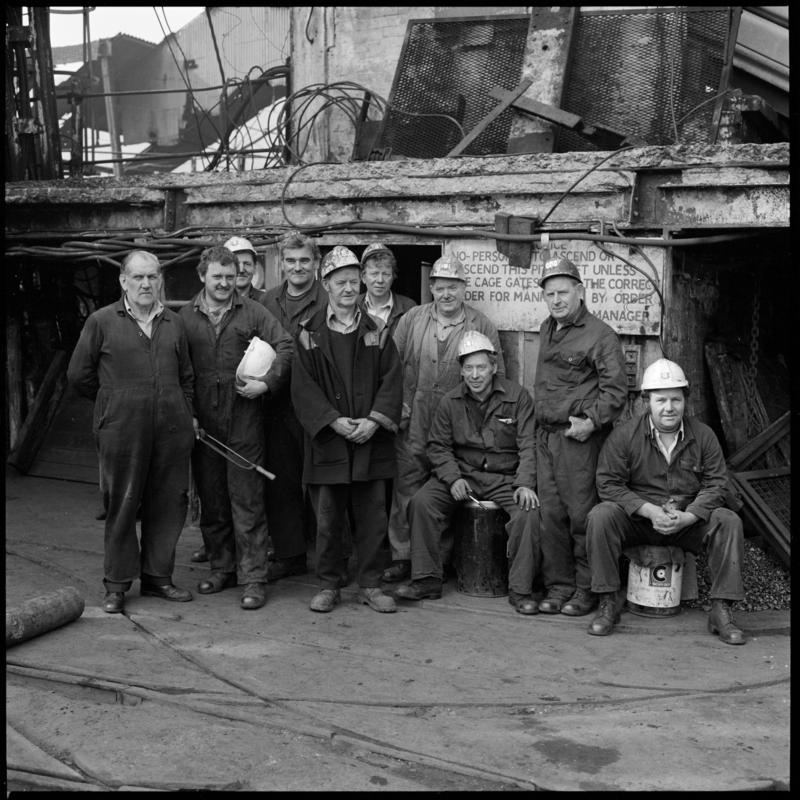 Black and white film negative showing a group of miners at pit top, Deep Duffryn Colliery, 15 April 1980.  &#039;Deep Duffryn 15/4/80&#039; is transcribed from original negative bag.