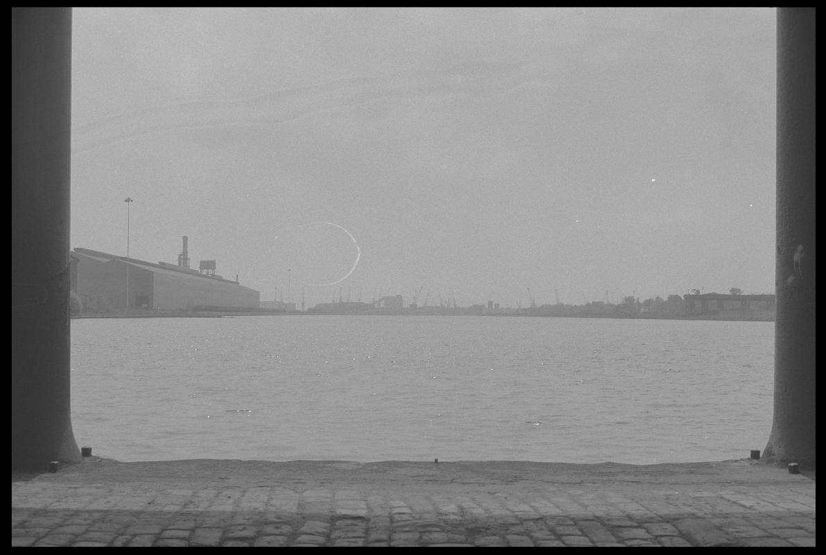 Bute East Dock from between pillars of old warehouse.