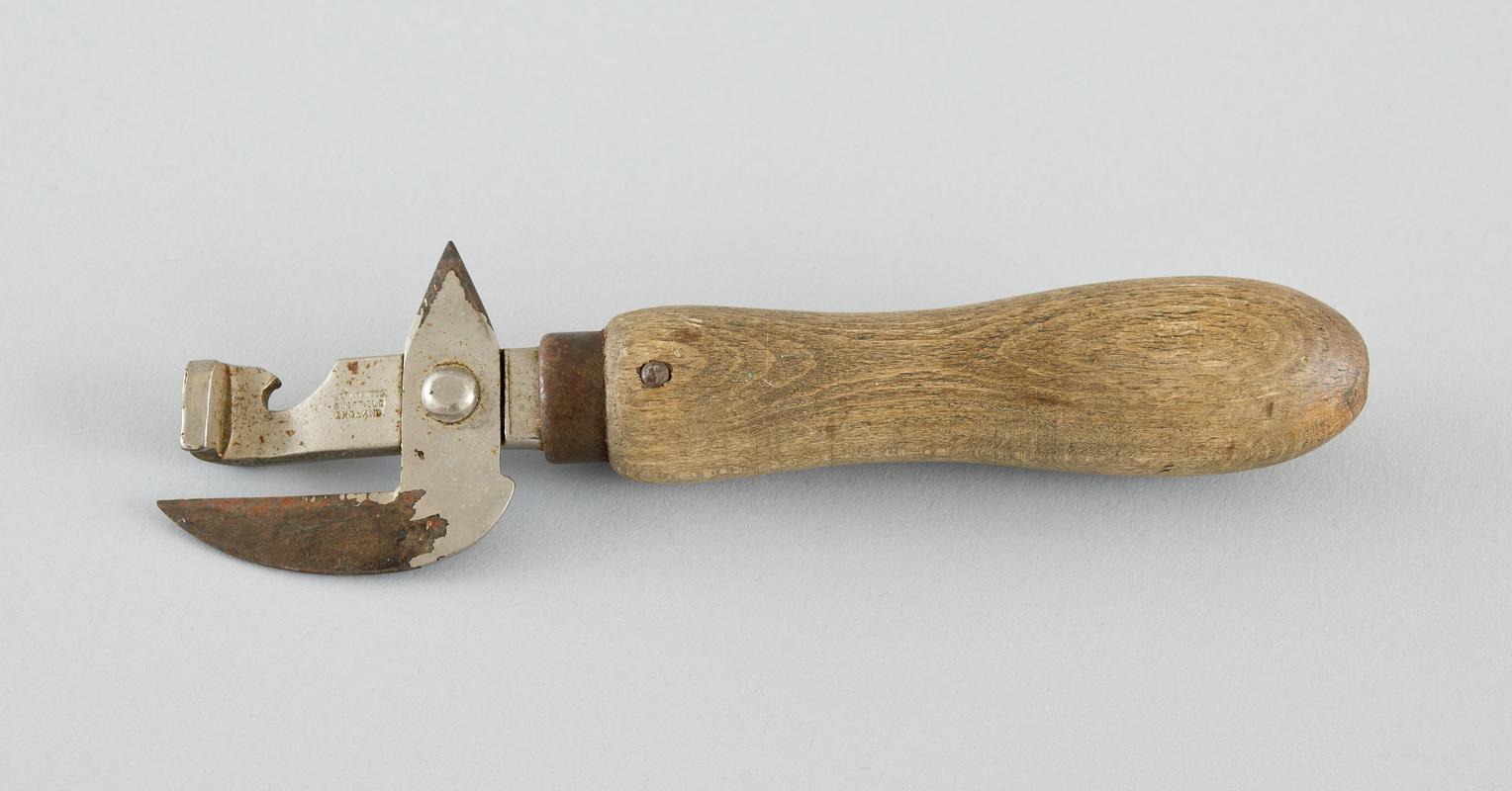 Tin opener with wooden handle.