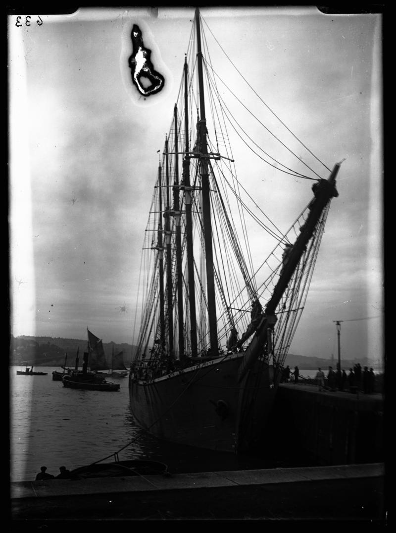 Bow view of the five masted schooner EDNA HOYT with tug &amp; ketch, 1936-1937