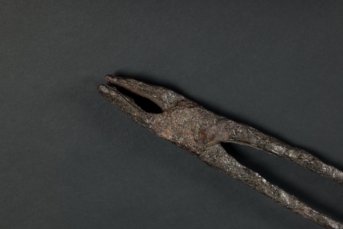 Medieval iron tongs
