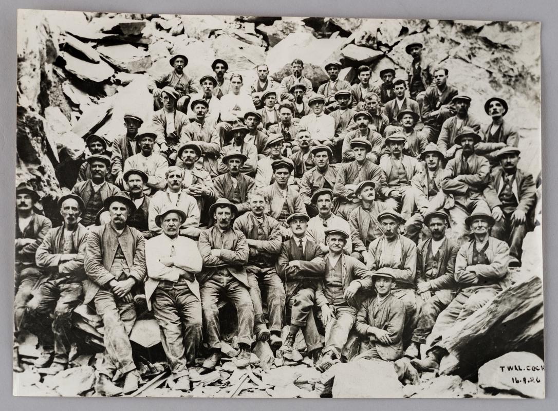 Group of 57 quarrymen at Twll Coch, Dorothea slate quarry, 16 September 1926.