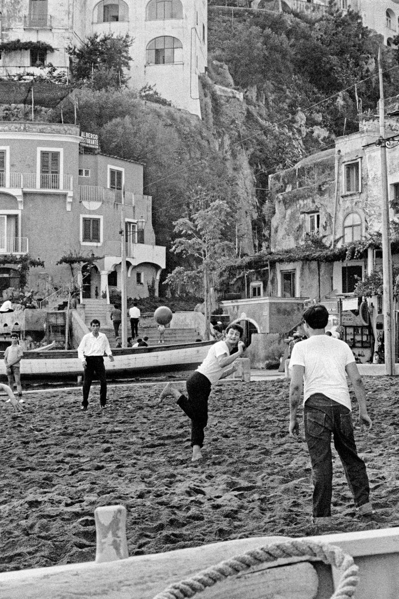 ITALY. Positano. Football on the beach. 1964.