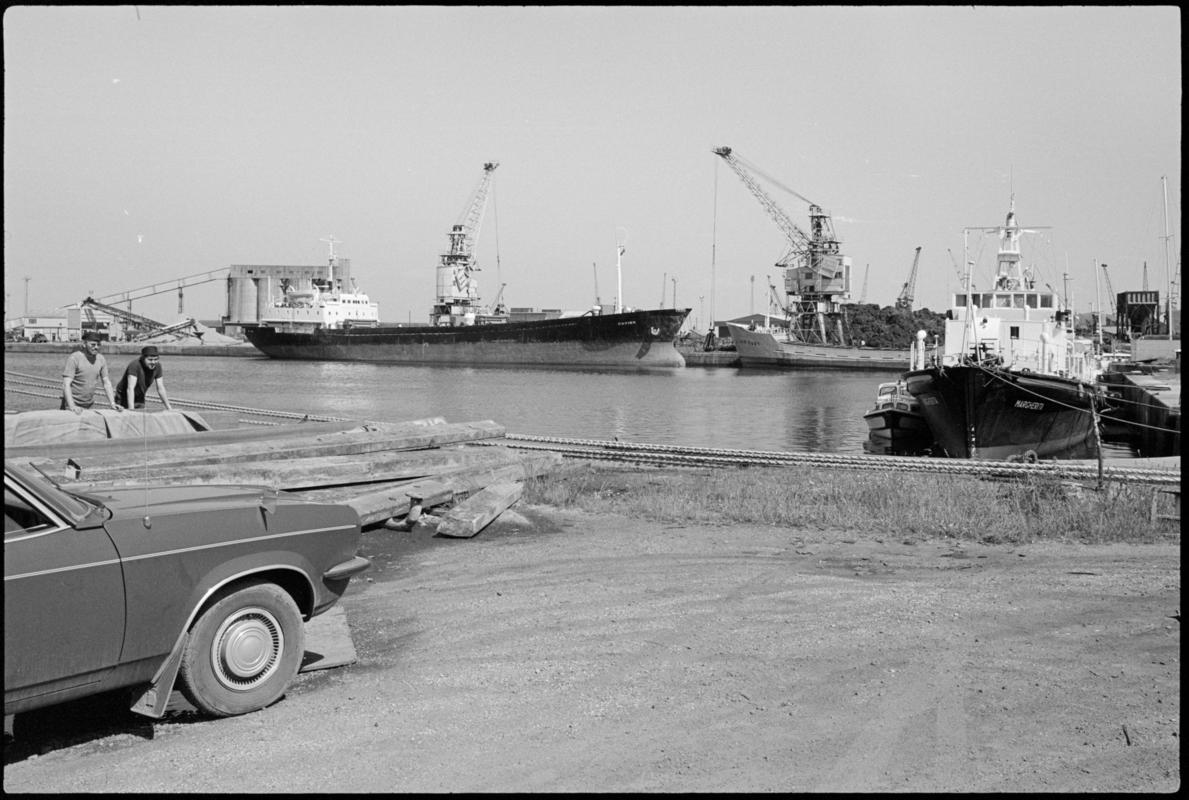 Roath Dock with large vessel on far side.
