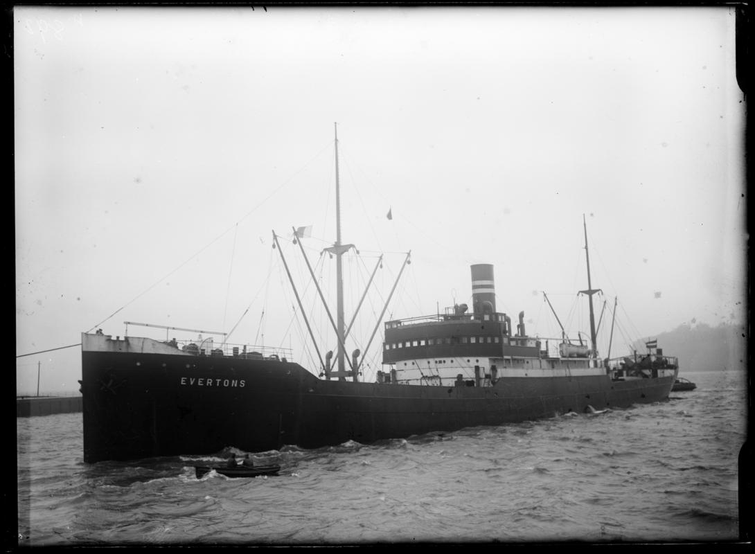 Three quarter Port bow view of S.S. EVERTONS and waterman&#039;s boat, Penarth Head, c.1936.