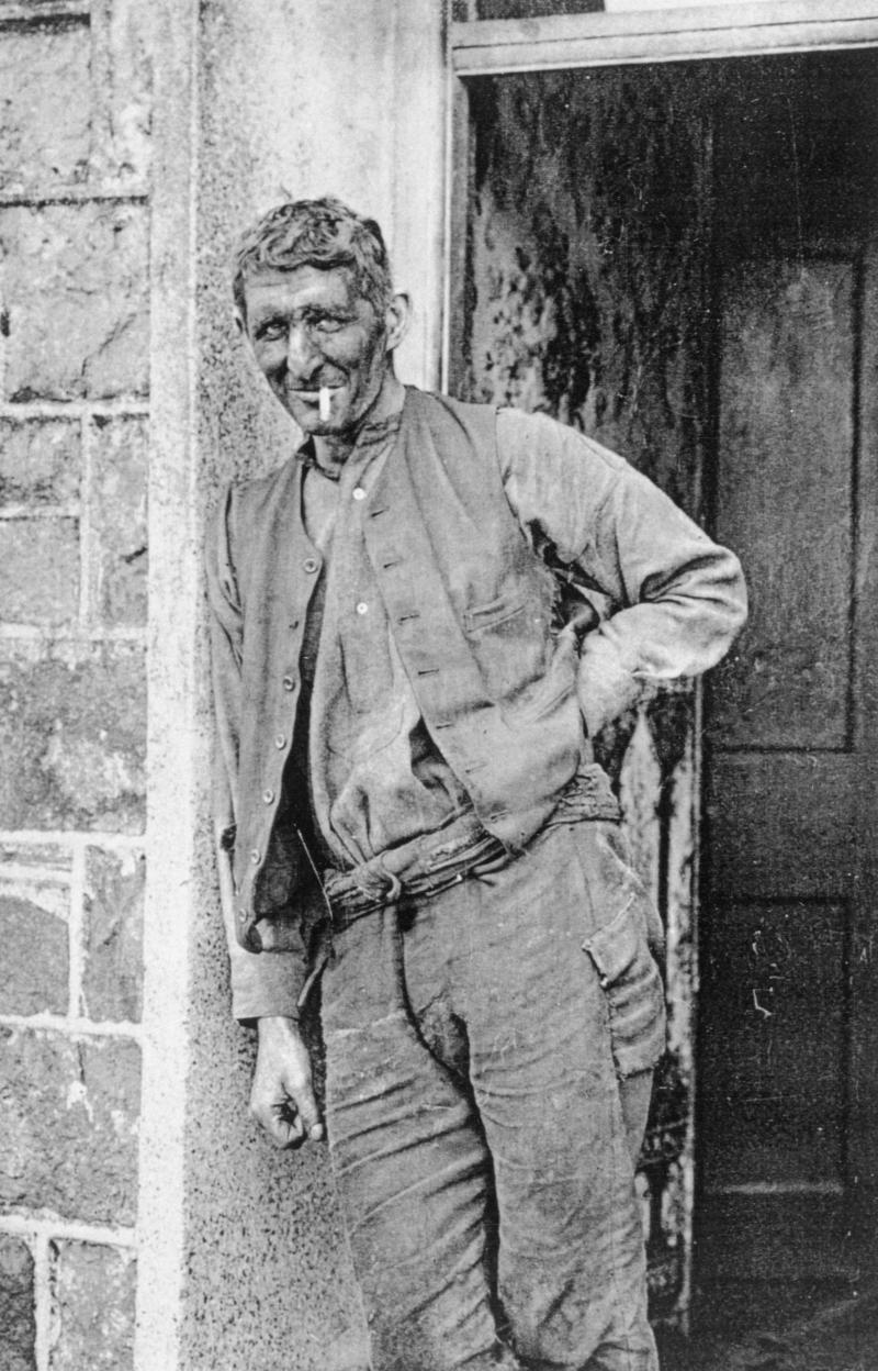 Mr Frederick Tuck, a miner, outside his house in York Terrace, Tredegar.