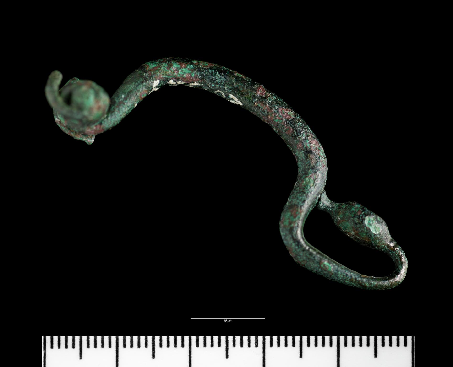 Early Iron Age bronze bow brooch