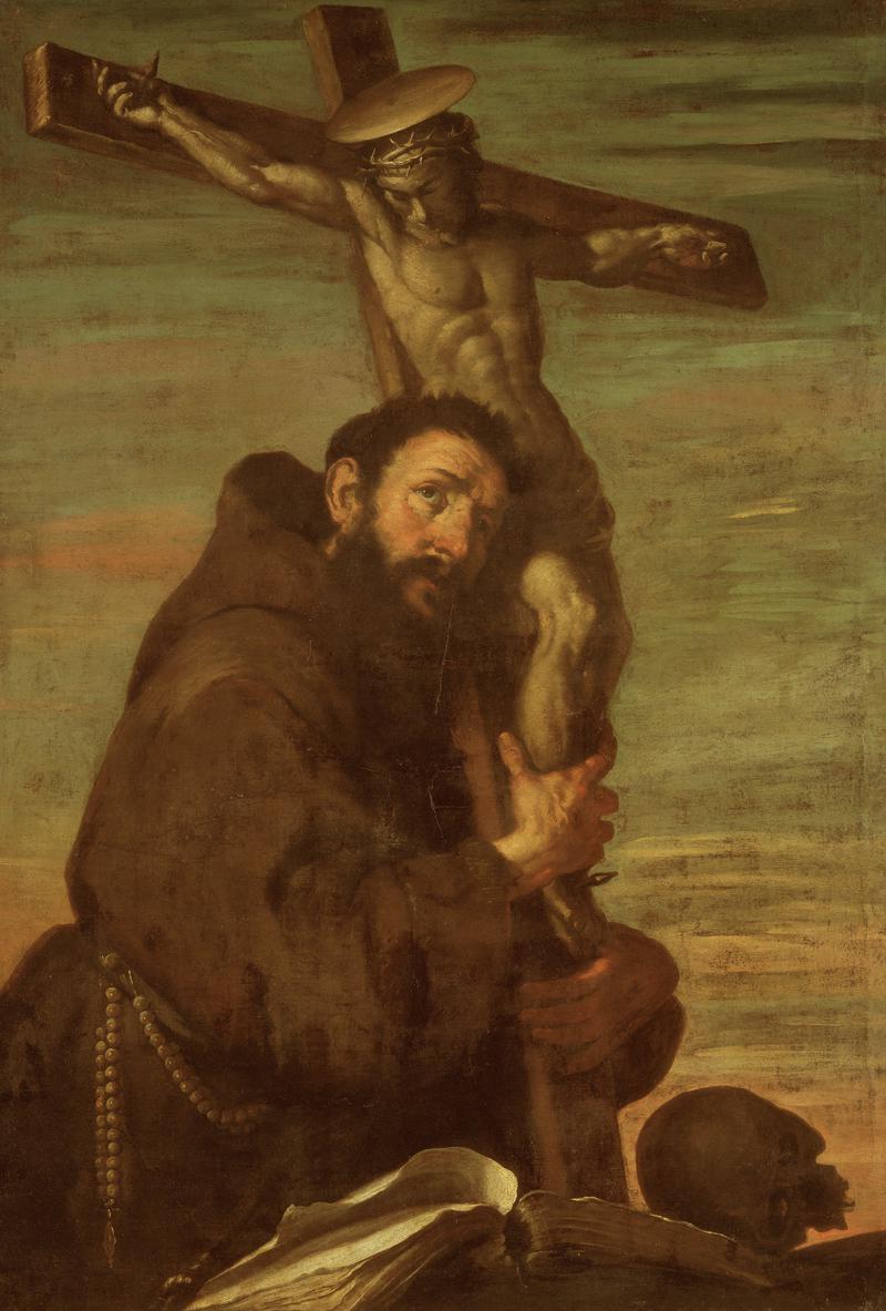 St Francis of Assisi embracing a crucifix