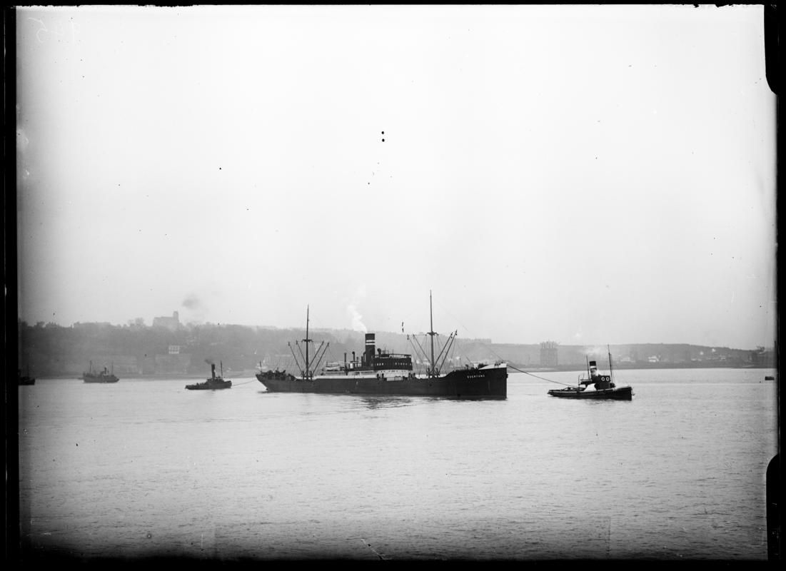 Starboard broadside view of S.S. EVERTONS and two tugs at Penarth Head, c.1936.
