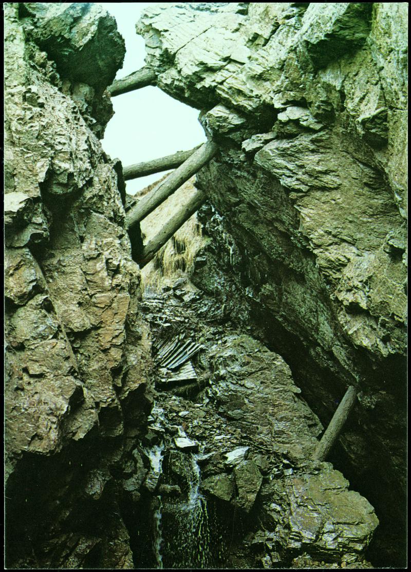 Old Lead and Zinc workings at Frongoch Mine near Devil&#039;s Bridge, showing the &#039;stullis&#039;, or timbers, on which the miners worked