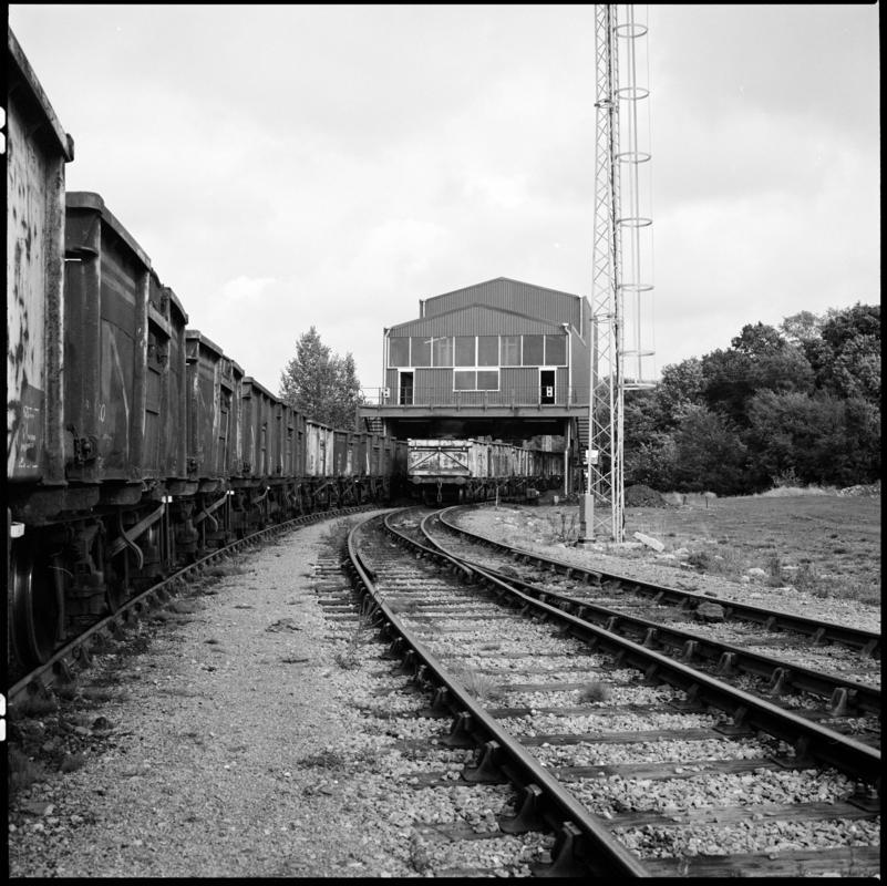 Black and white film negative showing a railtrack and carriages, Betws Mine.  &#039;Betws Mine&#039; is transcribed from original negative bag.