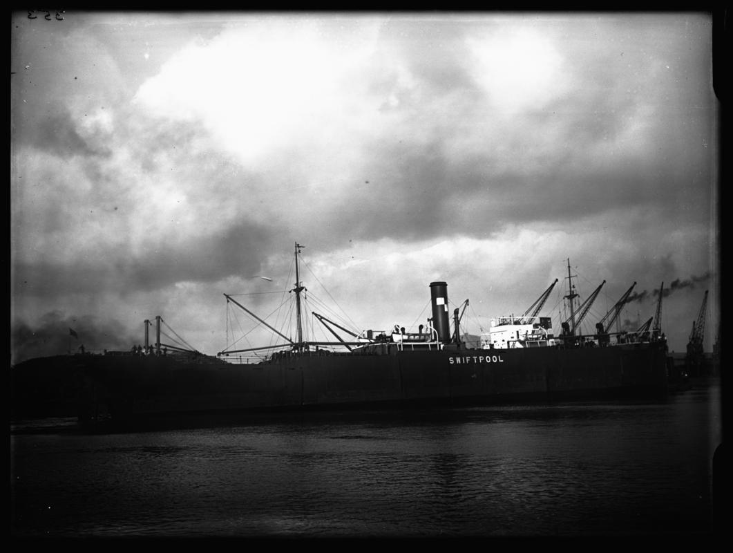 Starboard broadside view of S.S. SWIFTPOOL at Cardiff Docks, c.1936.