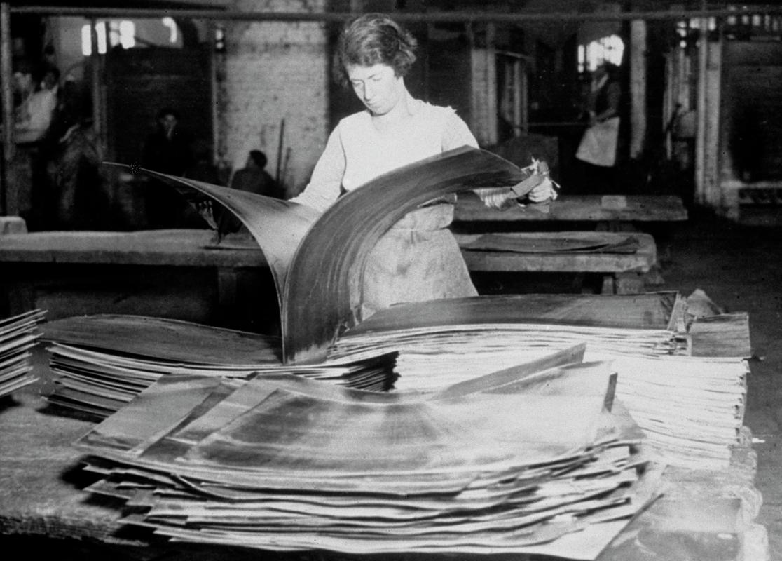 Woman worker tinplate stripping at Melingriffith tinplate works