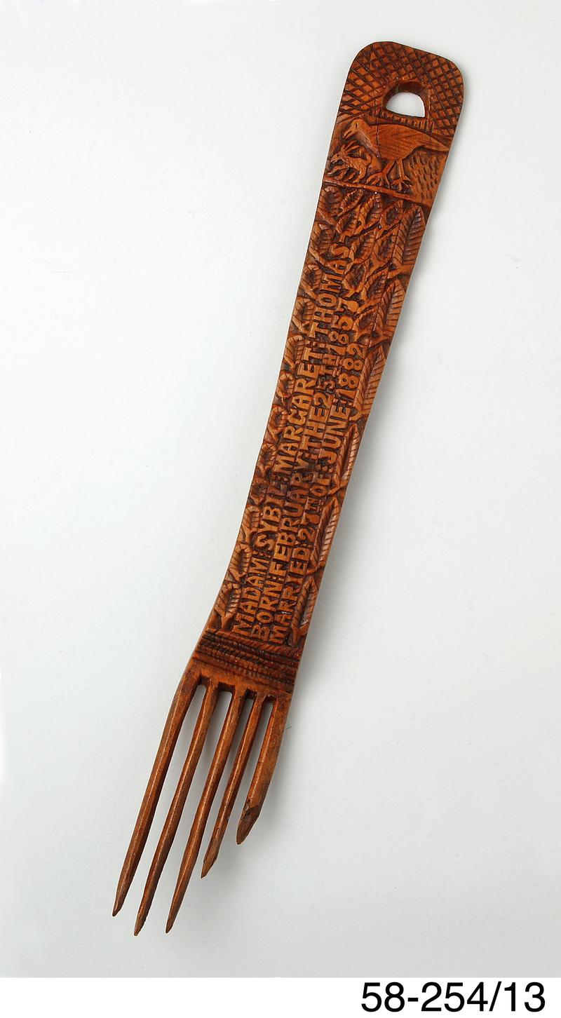 Carved fork, part of set