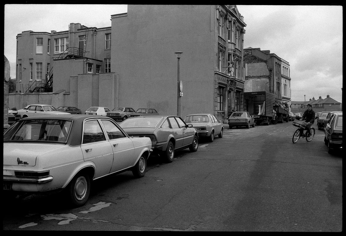 Cars parked in Mount Stuart Square, outside Aberdare House.