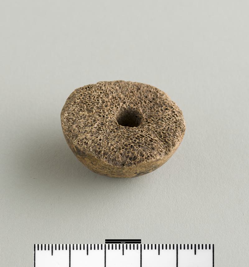 Roman bone spindle whorl