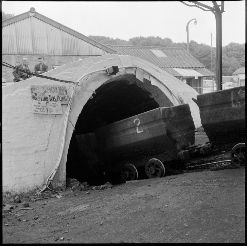 Black and white film negative showing drams being lowered into the slant, Ammanford Colliery 7 September 1976.  &#039;Ammanford slant, 7 Sep 1976&#039; is transcribed from original negative bag.