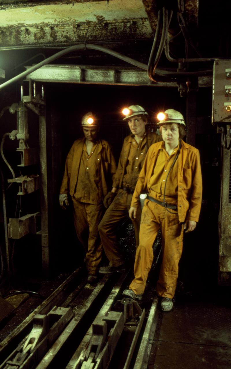 Colour film slide showing three miners at pit bottom, Oakdale Colliery 21 May 1981.