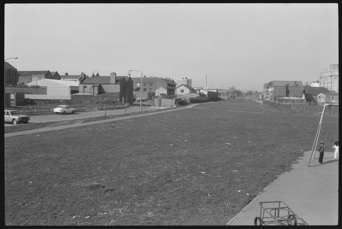 North view along route of old canal towards James Street, Butetown.