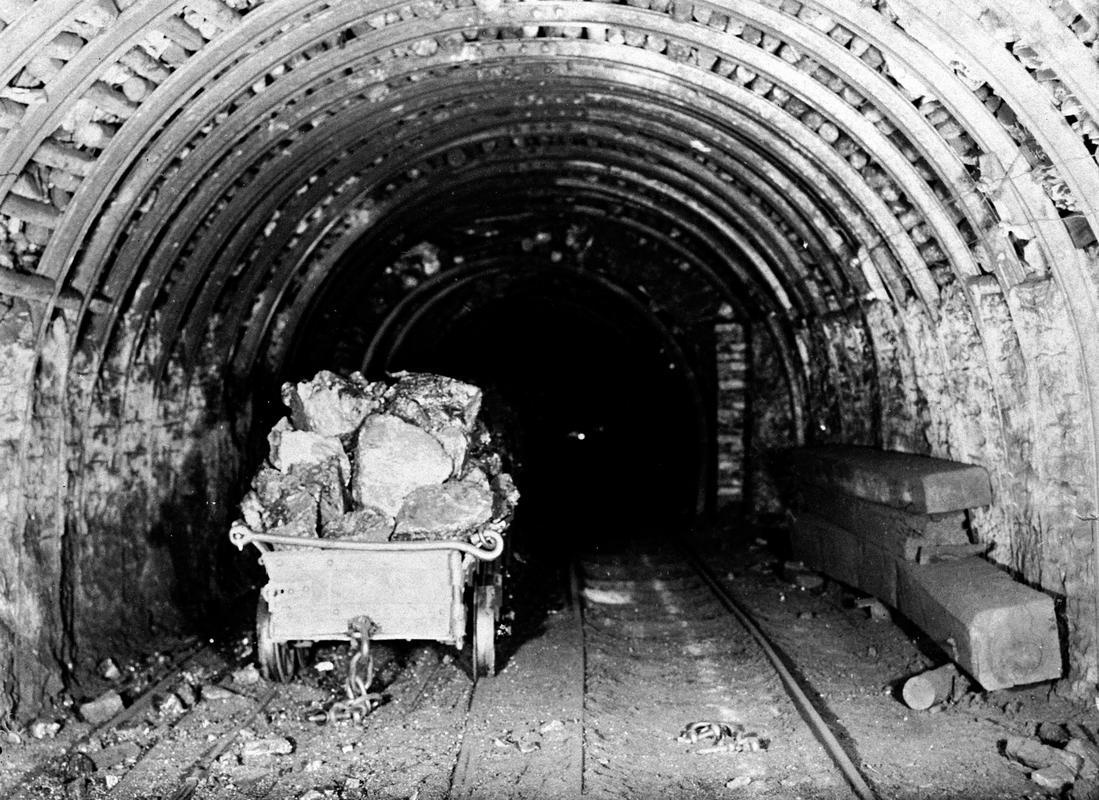 Full coal tram in underground roadway at Dare Colliery, Treorchi.