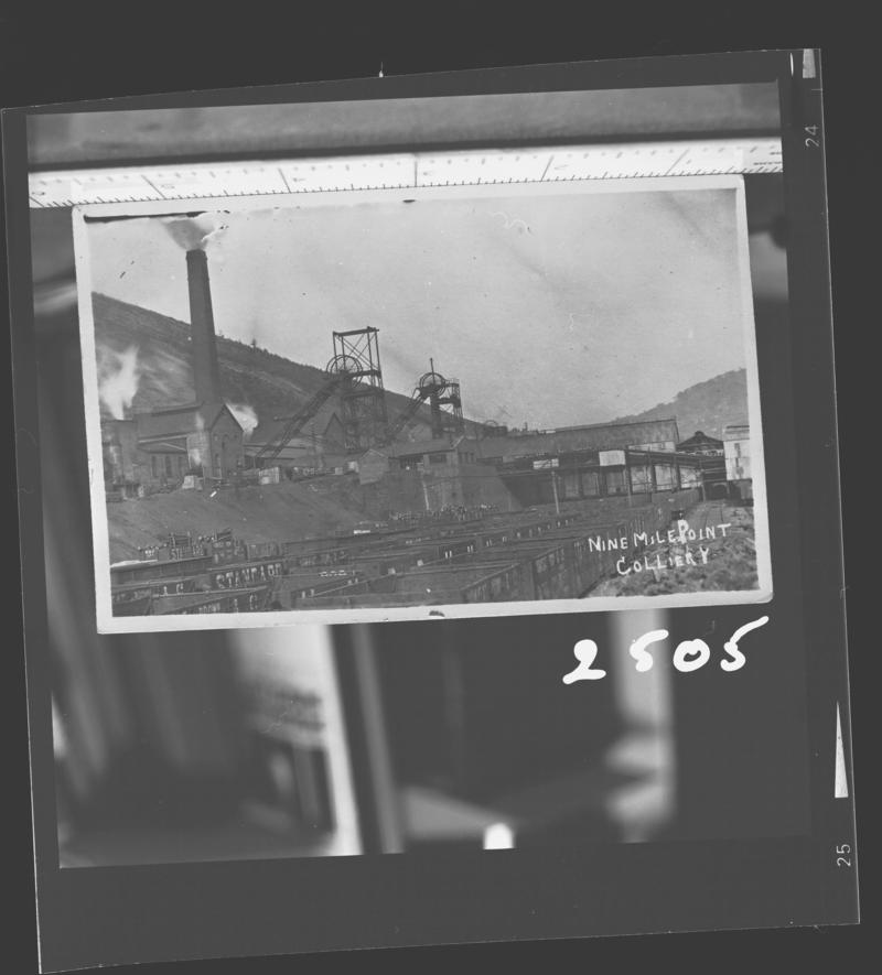 Black and white film negative of a photograph showing a surface view of Nine Mile Point Colliery, Cwmfelinfach.