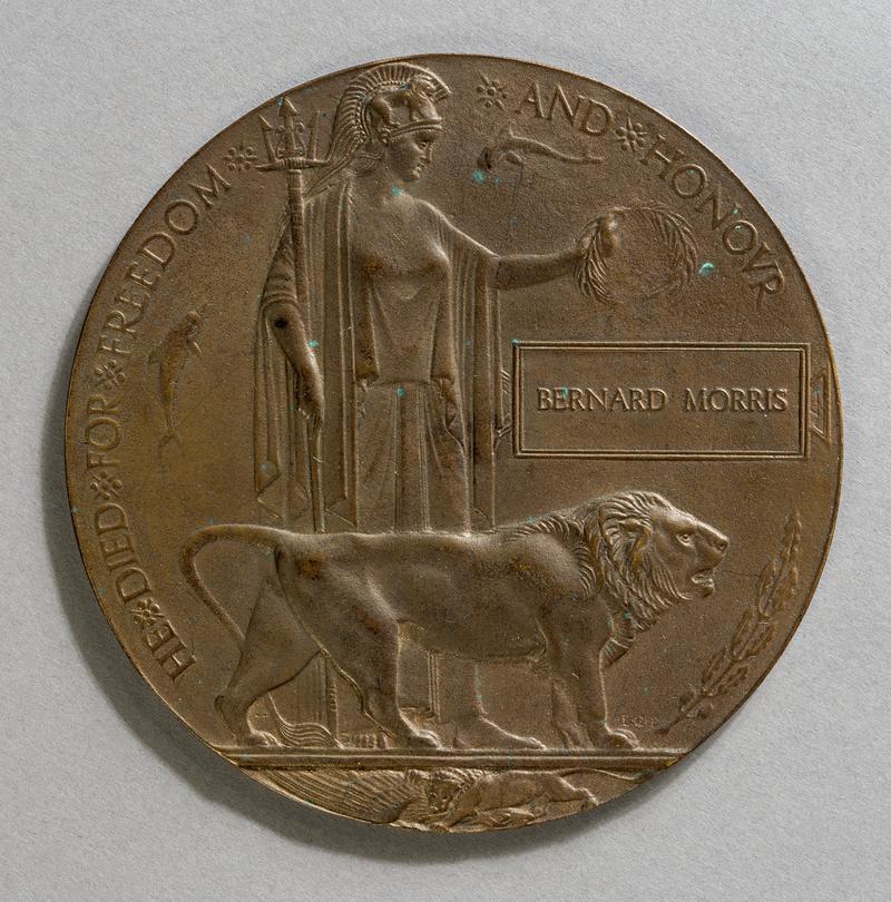Bronze memorial plaque in envelope, often known as a &#039;Dead Man&#039;s Penny&#039;. Issued to the next of kin of Petty Officer Bernard Morris.