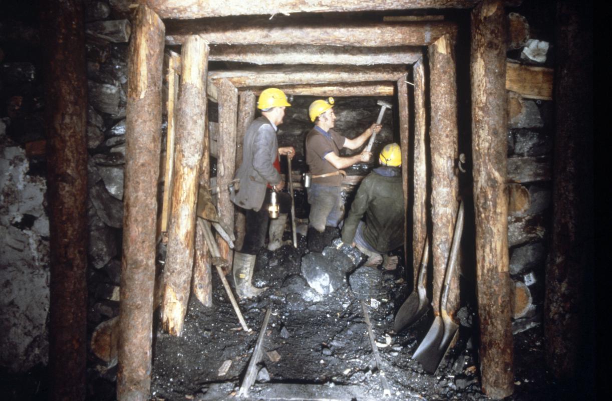 Miners working underground at Big Pit