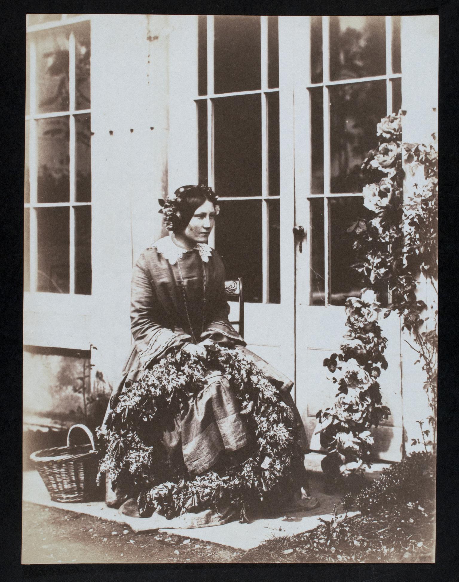 Thereza Llewelyn with flower wreath, photograph