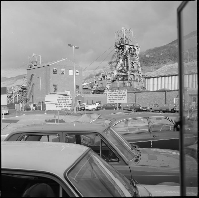 Black and white film negative showing Merthyr Vale Colliery and carpark, 1976.  &#039;Merthyr Vale 1976&#039; is transcribed from original negative bag.