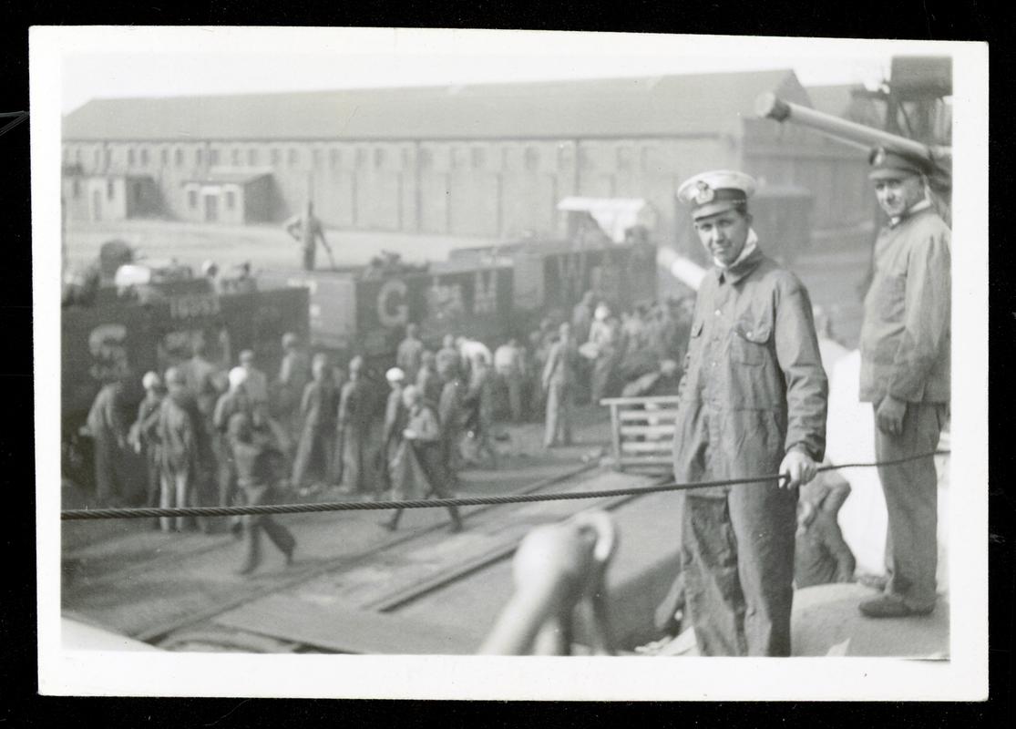 Swedish cruiser FYLGIA bunkering coal, photograph