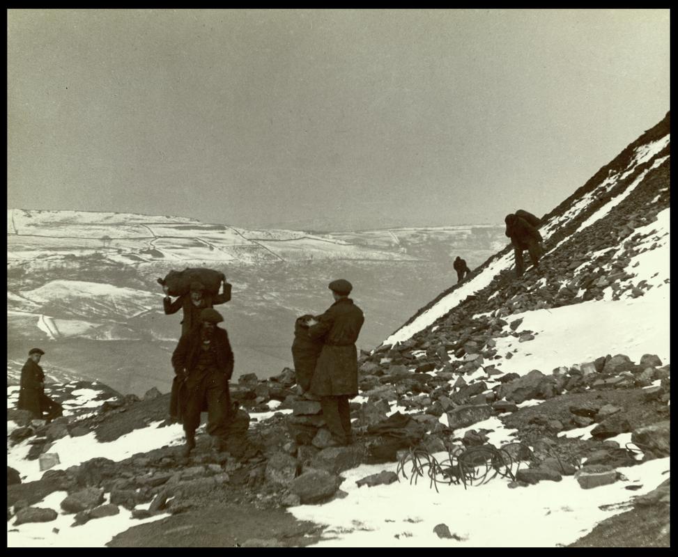 Unemployed Miners in the Rhondda, Picking coal off the slag-heaps in the snow