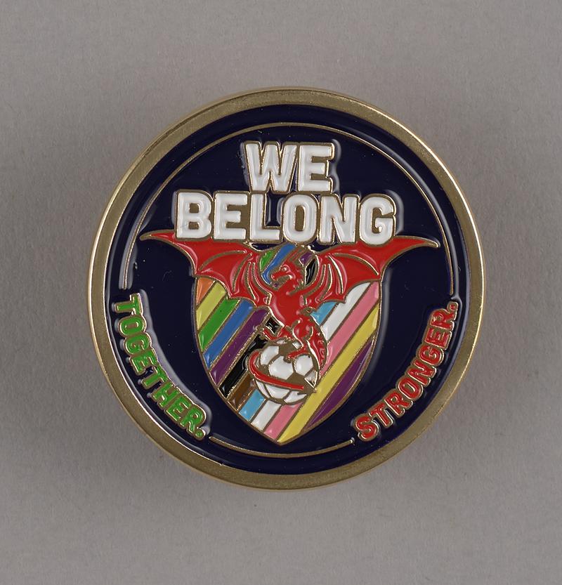 Badge &#039;We Belong&#039;.