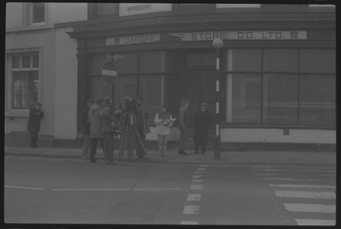 Cardiff Ship Stores on Bute Street, with a film crew on pavement alongside. This later became part of the Welsh Industrial Maritime Museum (W.I.M.M.).