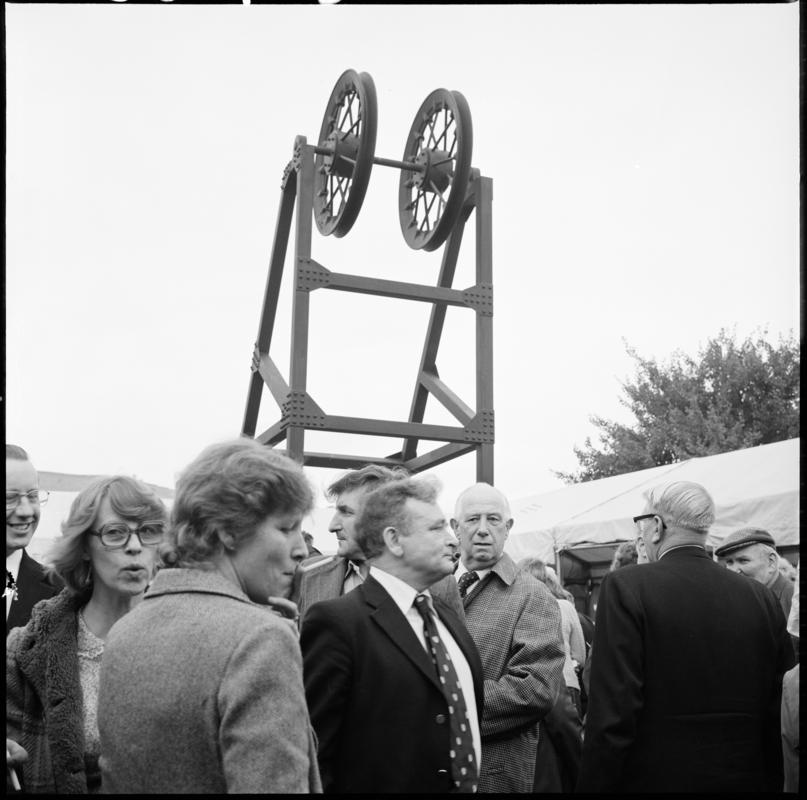 Black and white film negative showing the unveiling ceremony of the Senghenydd memorial, commemorating the 1913 Universal Colliery explosion.  The negative is undated but the ceremony took place in October 1981. &#039;Senghenydd&#039; is transcribed from original negative bag.