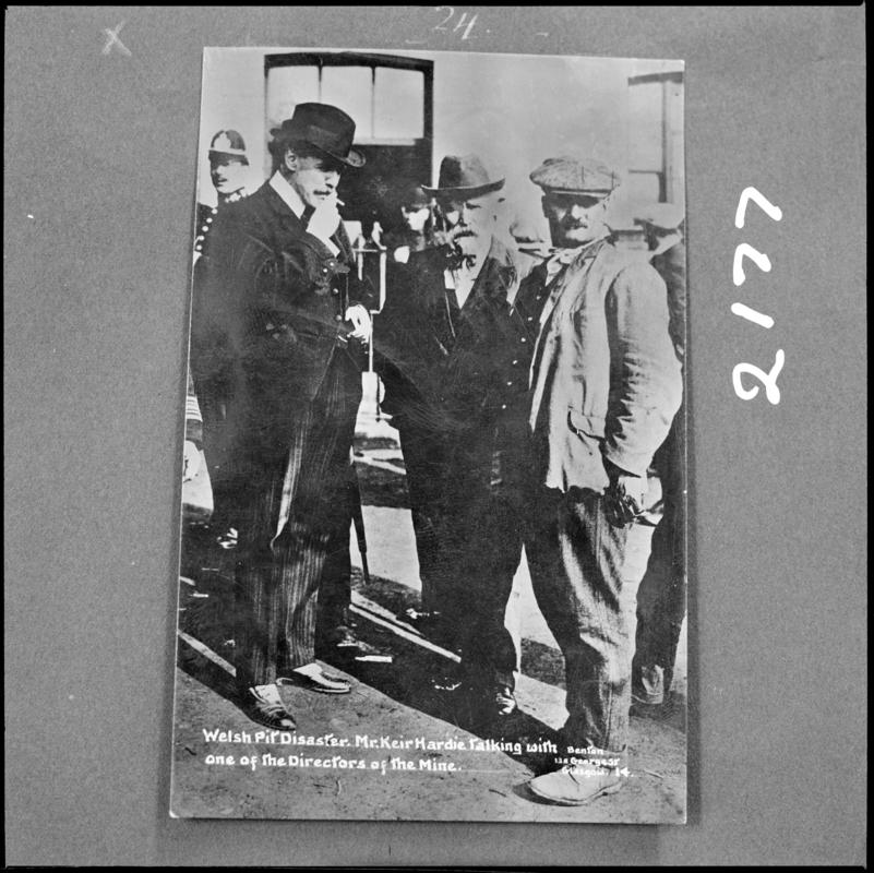 Black and white film negative of a photograph showing Keir Hardie talking to one of the Directors of the mine following the Universal Colliery disaster of 14 October 1913.  &#039;Sen 1913&#039; is transcribed from original negative bag.