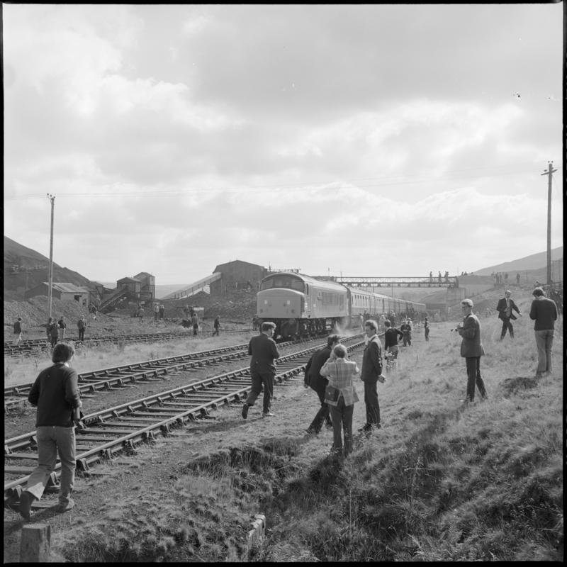 Black and white film negative showing a train passing the washery, Big Pit Colliery.