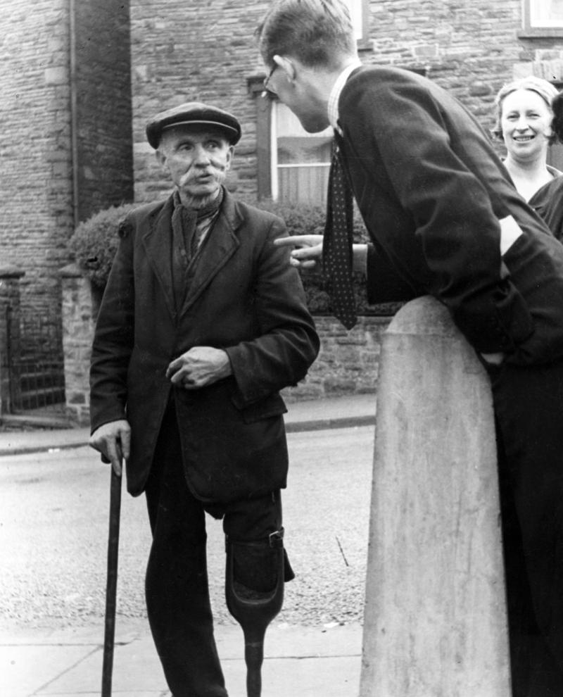 Elderly Man with wooden leg in a street near Pontypridd