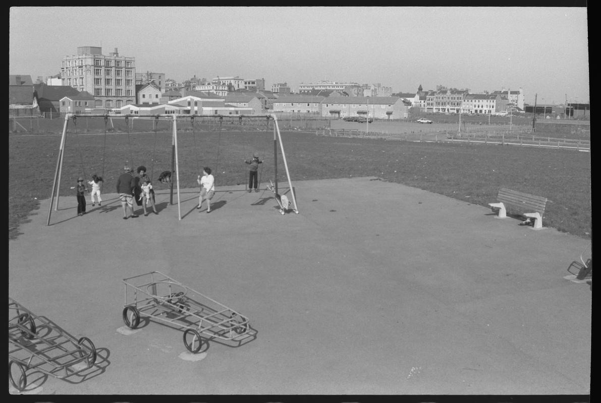 Children&#039;s playground with rear of James Street in background.