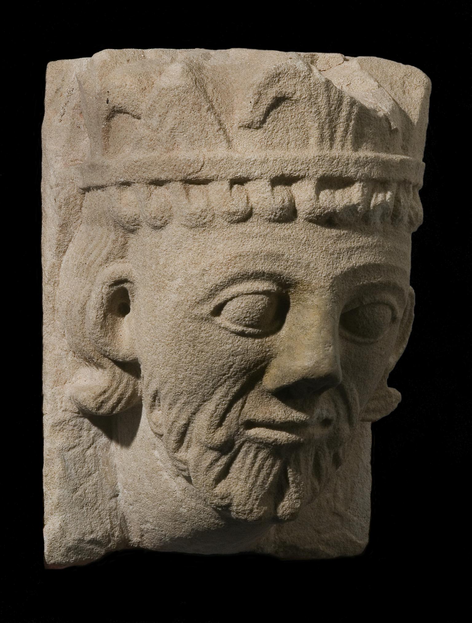 Medieval stone carved head