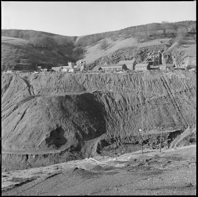 Black and white film negative showing a view towards Blaenserchan Colliery, 1978-9.  &#039;Blaenserchan 1978-9&#039; is transcribed from original negative bag.