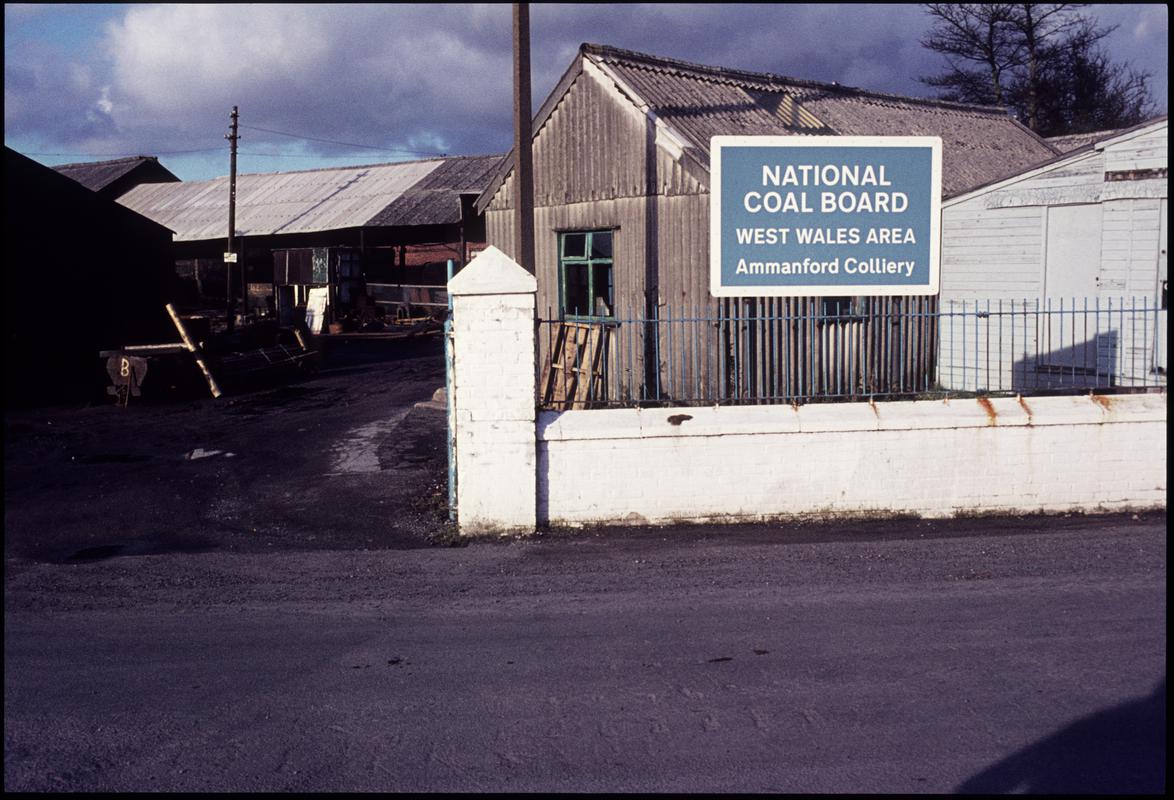 Colour film slide showing Ammanford Colliery NCB sign, 19 February 1977.