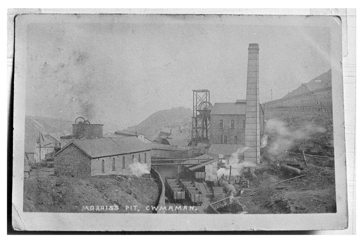 Black and white film negative of a photograph showing a surface view of Morris Pit, Cwmaman.  &#039;Morris Pit Cwmaman&#039; is transcribed from original negative bag.