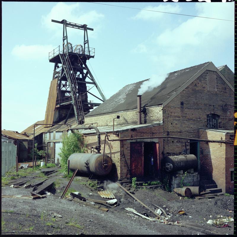 Colour film negative showing a view of the headgear and engine house, Morlais Colliery 13 May 1981.  &#039;Morlais 13/5/81&#039; is transcribed from original negative bag.  Appears to be identical to 2009.3/1819.