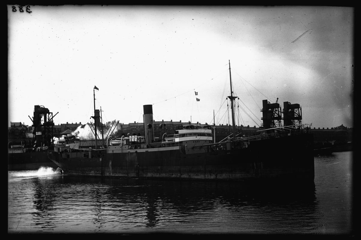 Starboard broadside view of S.S. BARON KINNAIRD at Barry Docks, c.1936.