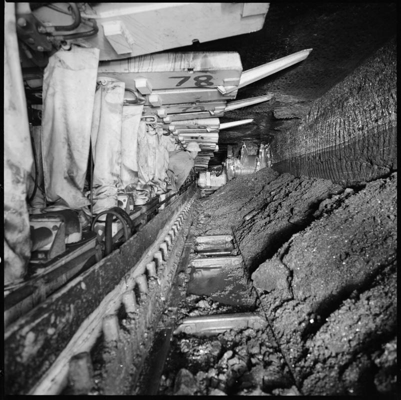 Black and white film negative showing chainless haulage on the face with Gullick Dobson powered supports, Betws Mine.  Appears to be identical to 2009.3/3079.