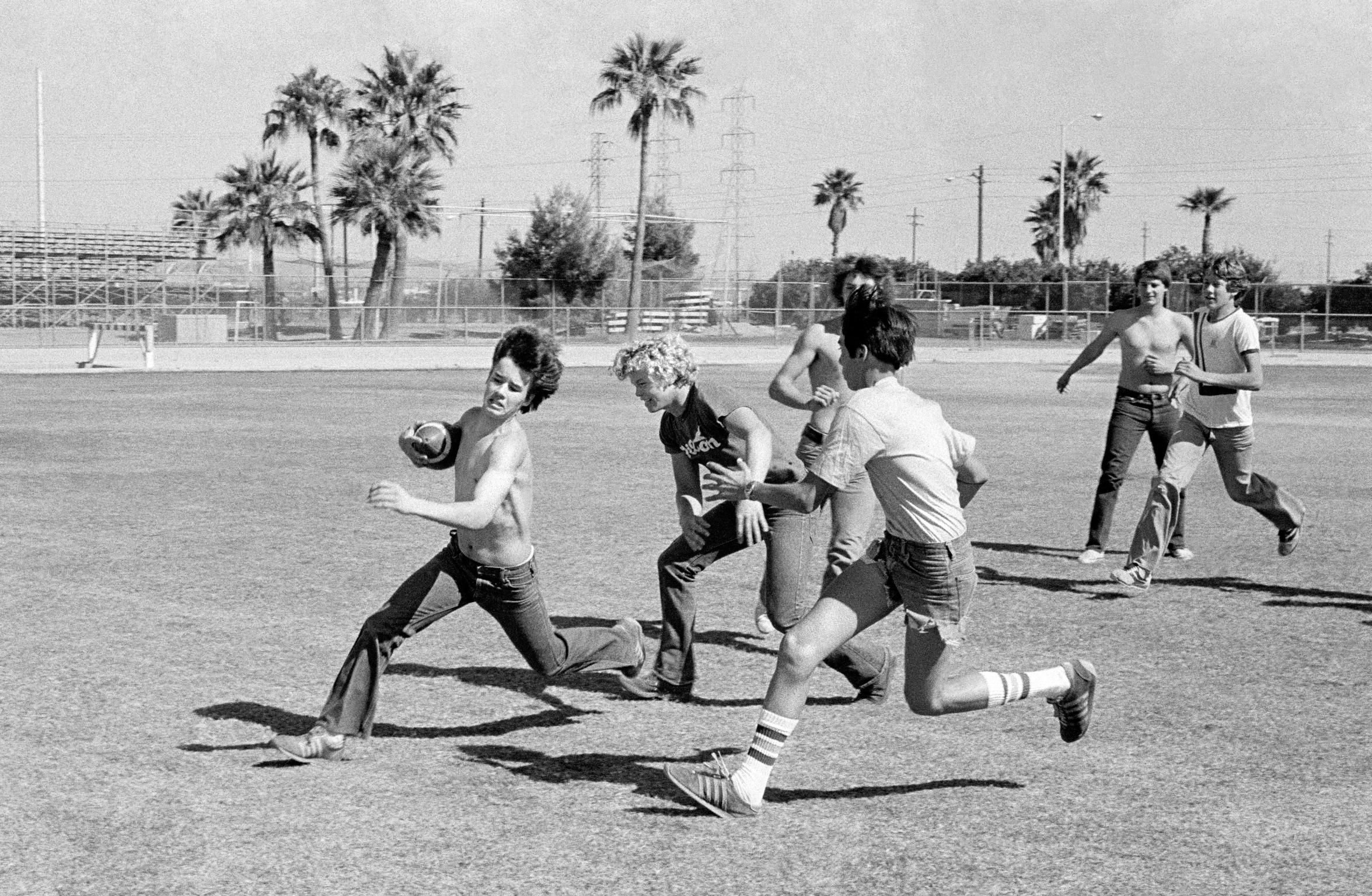 Student football run-around on the campus grounds of ASU. Tempe, Arizona USA