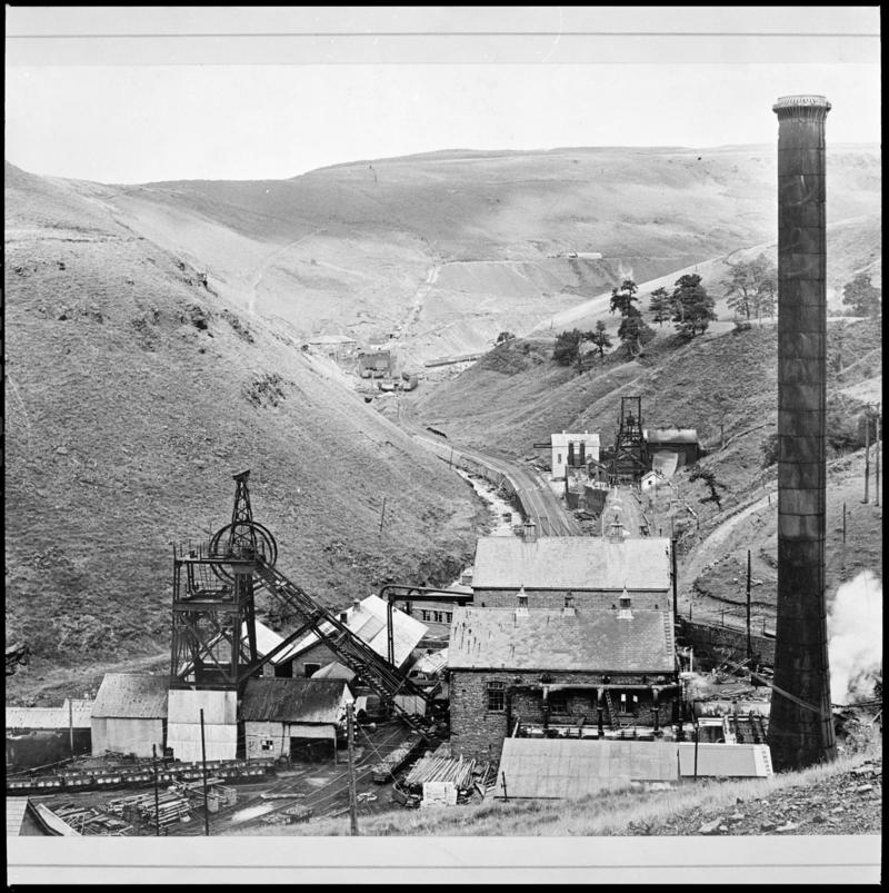 Black and white film negative showing a surface view of Glyncorrwg Colliery. &#039;Glyncorrwg&#039; is transcribed from original negative bag.
